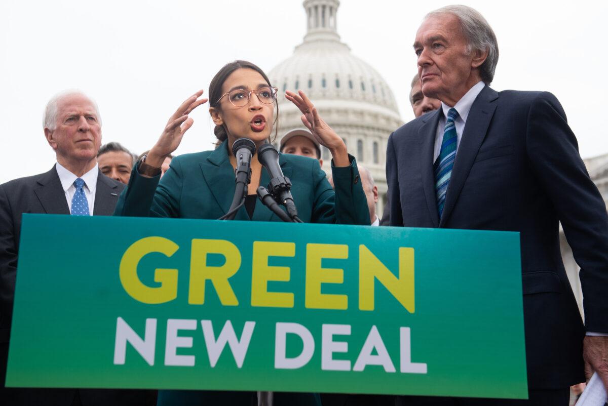 U.S. Rep. Alexandria Ocasio-Cortez (D-N.Y.) and U.S. Sen. Ed Markey (D-Mass.) (R) speak during a press conference to announce Green New Deal legislation to promote clean energy programs outside the U.S. Capitol on Feb. 7, 2019. (Saul Loeb/AFP via Getty Images)