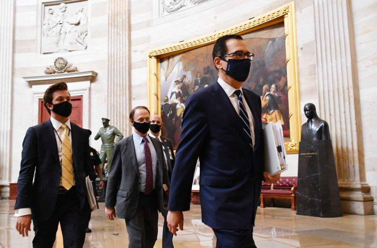 Treasury Secretary Steven Mnuchin heads to a meeting on the CCP virus relief bill at the U.S. Capitol in Washington on Aug. 4, 2020. (Mandel Ngan/AFP via Getty Images)