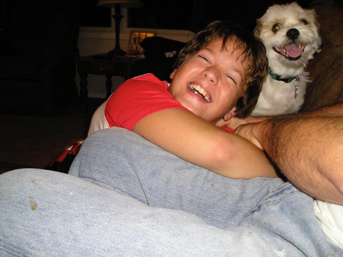 Then-6-year-old Robert Lee with his dog, Mackie. (Courtesy of <a href="https://www.facebook.com/ybboreel">Rob Lee</a>)
