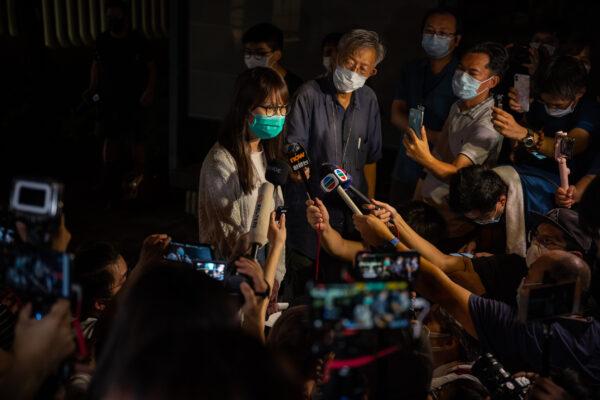 Hong Kong democracy activist Agnes Chow speaks to media after being released on bail from the Tai Po police station in Hong Kong on Aug. 11, 2020. (Billy H.C. Kwok/Getty Images)