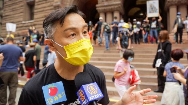 Well-known Hong Kong singer and actor Joe Tay is interviewed after the rally. (NTD Television)