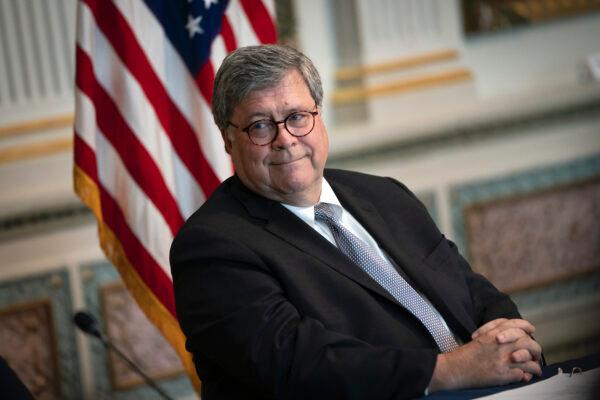 Attorney General William Barr listens during an event in the Indian Treaty Room of the Eisenhower Executive Office Building in Washington on Aug. 4, 2020. (Drew Angerer/Getty Images)