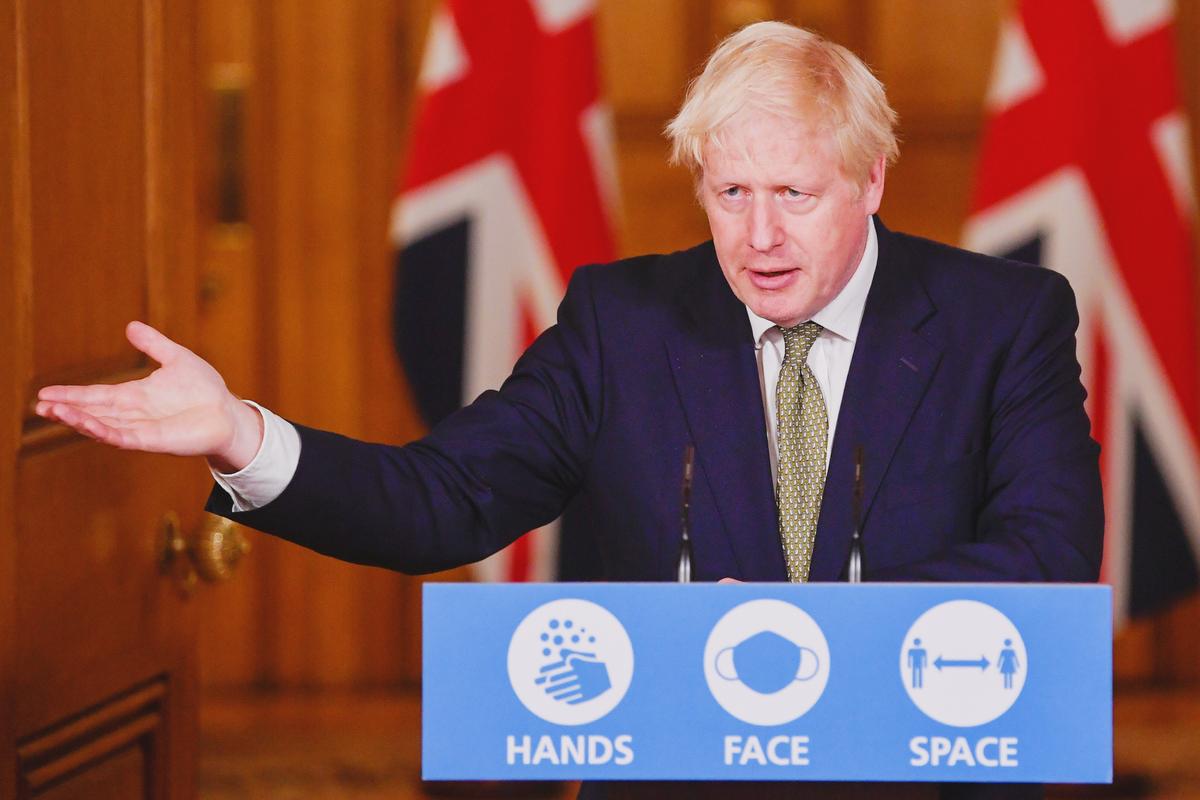 Britain's Prime Minister Boris Johnson gestures as he speaks during a virtual news conference on the ongoing situation with the CCP virus disease (COVID-19), at Downing Street in London, UK, on Oct. 12, 2020. (Toby Melville/Pool via Reuters)