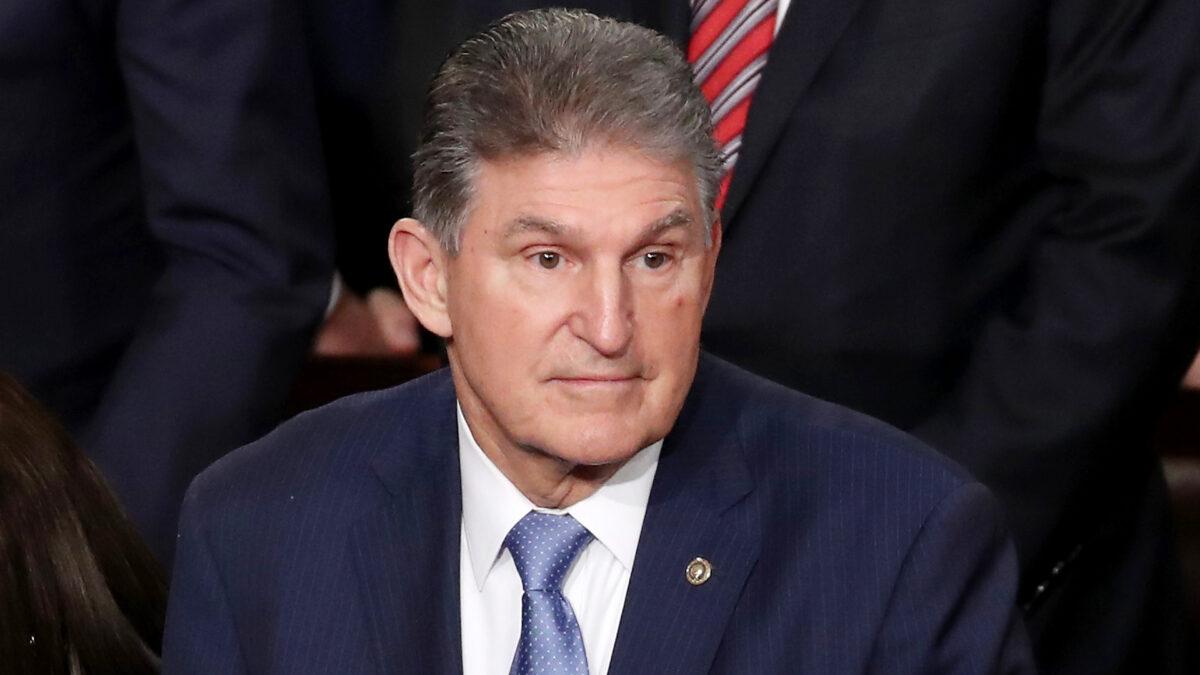 Sen. Joe Manchin (D-W.Va.) attends the State of the Union address in the chamber of the House of Representatives in Washington on Feb. 4, 2020. (Drew Angerer/Getty Images)