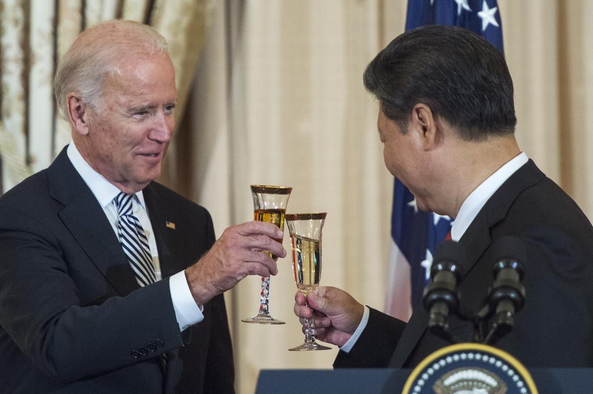 Then-U.S. Vice President Joe Biden and Chinese leader Xi Jinping toast during a state luncheon for China at the State Department in Washington on Sept. 25, 2015. (Paul J. Richards/AFP via Getty Images)