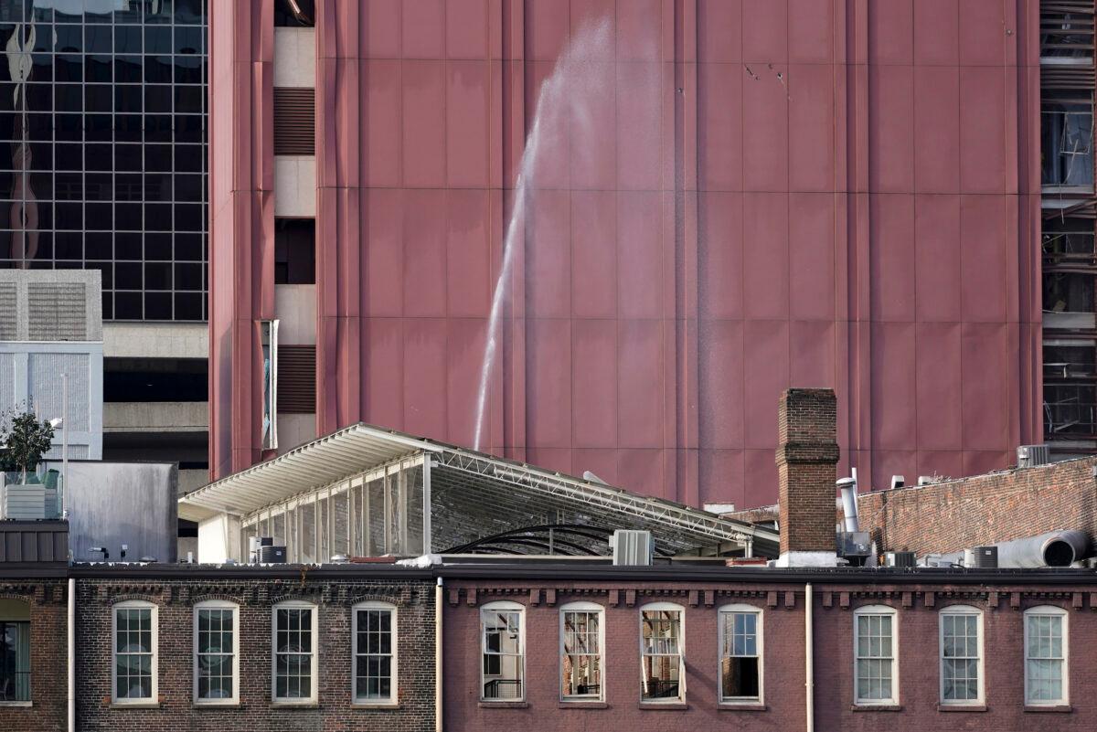Windows are blown out and a broken water pipe sprays in a building near the scene of an explosion in downtown Nashville, Tenn., on Dec. 25, 2020. (Mark Humphrey/AP Photo)