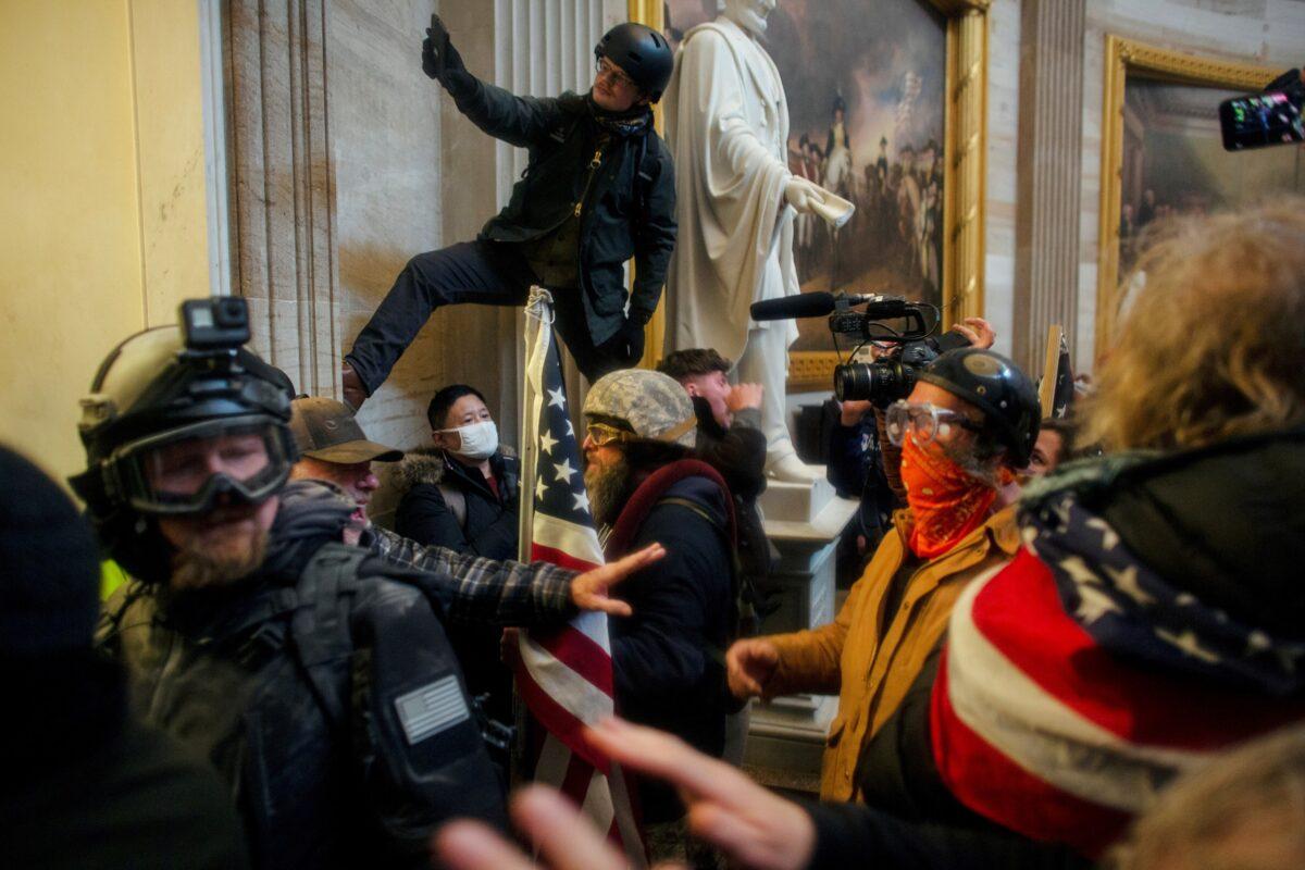 People storm the Capitol Building in Washington on Jan. 6, 2020. (Ahmed Gaber/Reuters)