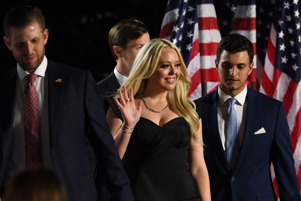 The U.S. president's children Eric Trump, Tiffany Trump and her fiancé Michael Boulos arrive for the U.S. president's acceptance speech for the Republican Party nomination for reelection during the final day of the Republican National Convention from the South Lawn of the White House in Washington on Aug. 27, 2020. (Saul Loeb/AFP via Getty Images)