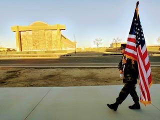 Jordan Ramirez carries an American flag in Southern California on Jan. 16, 2021. (Courtesy of Dimas Ramirez)