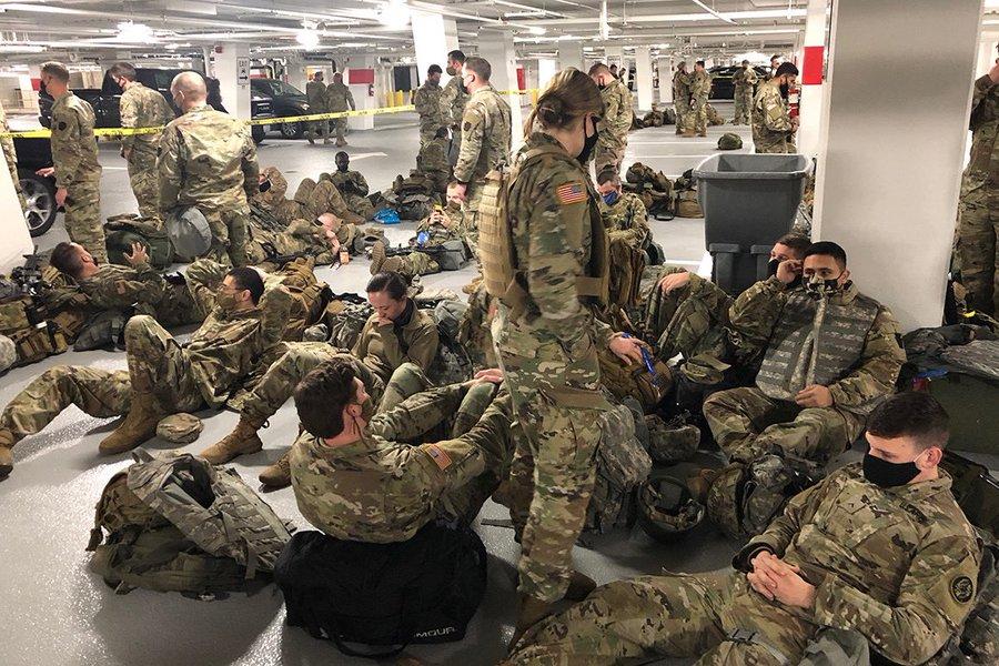 National Guardsmen in a garage on Capitol Hill. (Courtesy Kevin McCarthy)