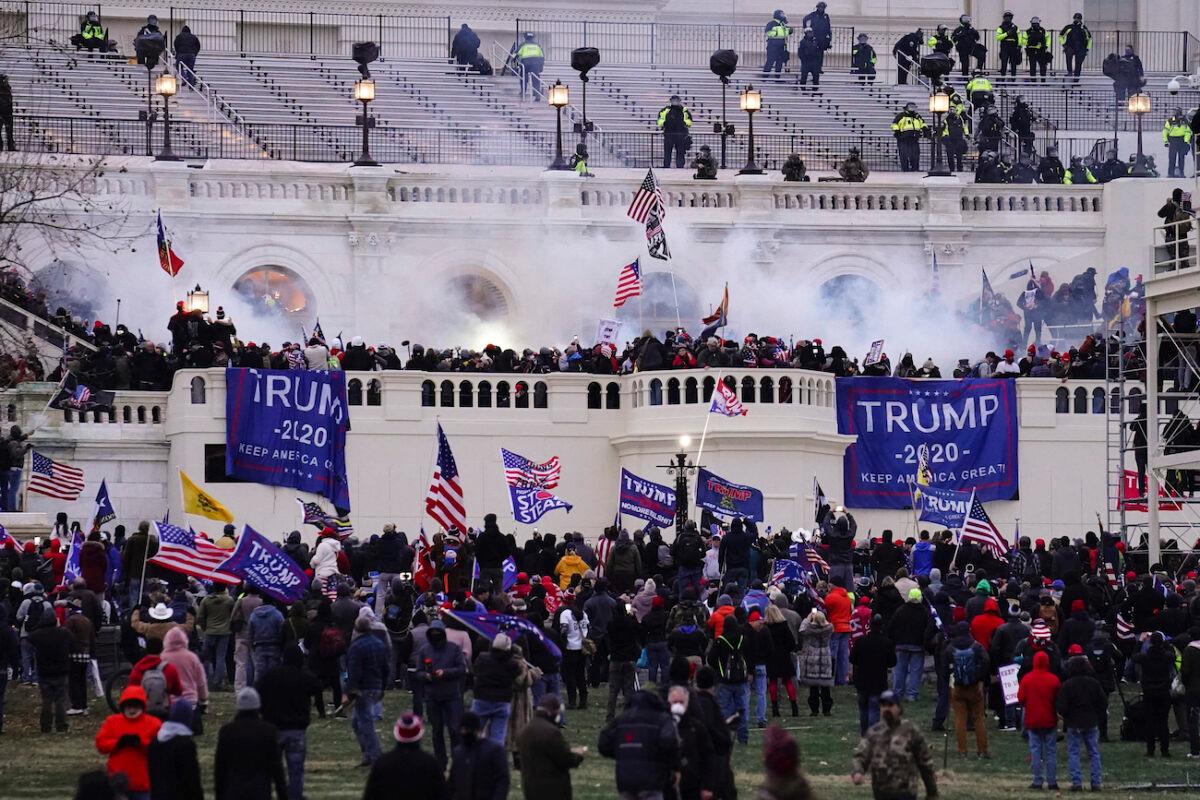 Rioters storm the Capitol in Washington on Jan. 6, 2021. (John Minchillo/AP Photo)