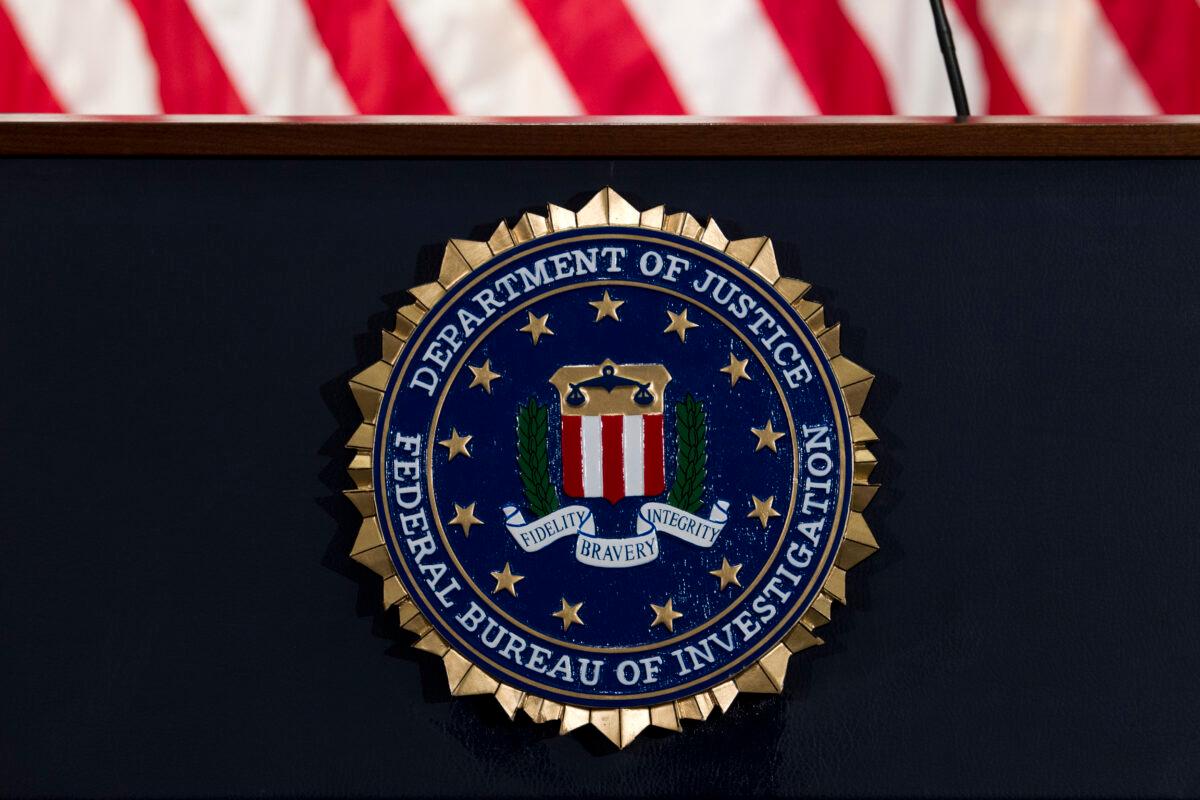 The FBI seal is seen before a news conference at FBI headquarters in Washington on June 14, 2018. (Jose Luis Magana/AP Photo)