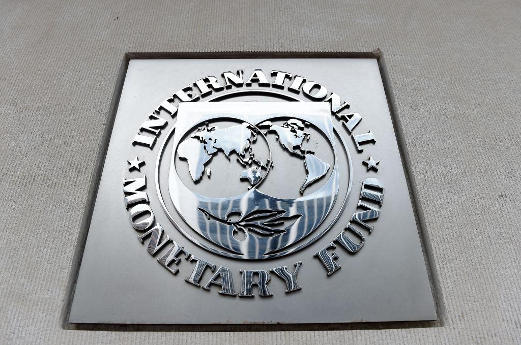 The International Monetary Fund logo on the side of the IMF building in Washington on March 27, 2020. (Olivier Douliery/AFP via Getty Images)