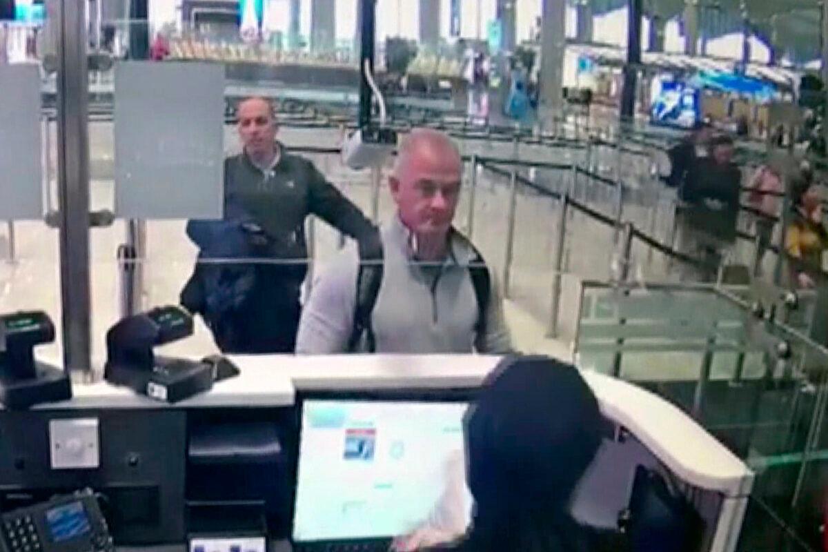 Security camera video shows Michael L. Taylor (C) and George-Antoine Zayek at passport control at Istanbul Airport in Turkey, on Dec. 30, 2019. (DHA via AP)