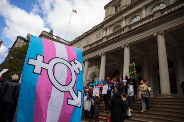LGBT activists and demonstrators rally in support of transgender people on the steps of City Hall in New York City, on Oct. 24, 2018. (Drew Angerer/Getty Images)