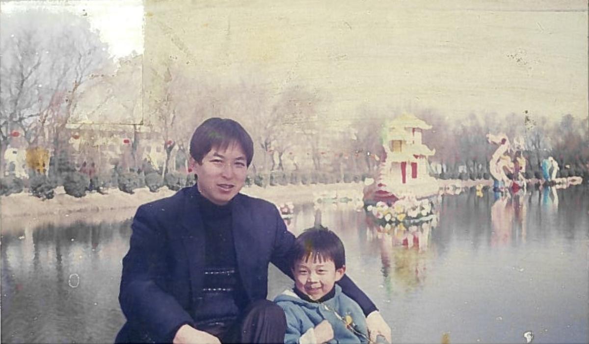 Eric Jia as a toddler with his father Ye Jia. (Courtesy of Eric Jia)