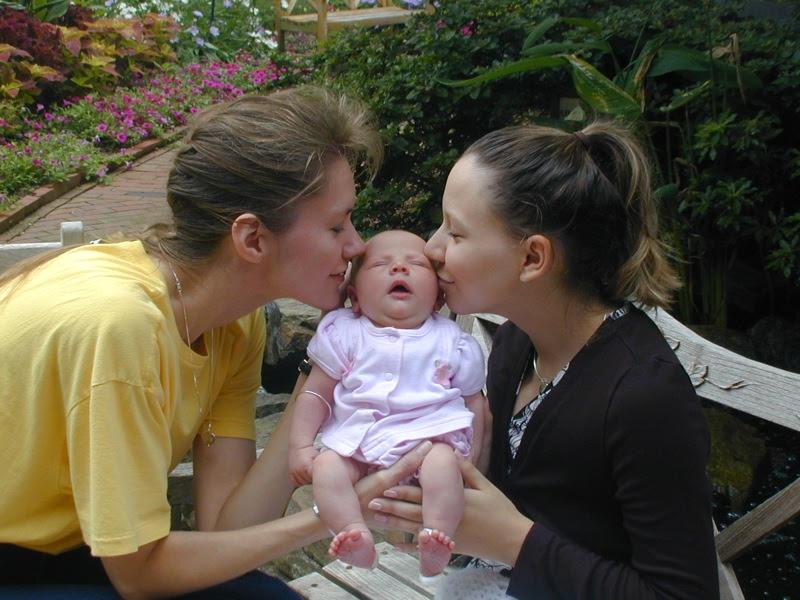 Leah (R) with her baby, and the baby's adoptive mother. (Courtesy of <a href="https://www.thegracebond.com/">Leah Outten</a>)