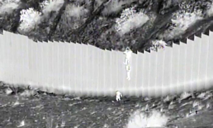CBP Agent Rescues Sisters Dropped by Smuggler Over 14-Foot Border Barrier