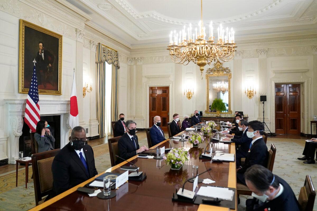President Joe Biden meets with Japanese Prime Minister Yoshihide Suga in the State Dining Room of the White House in Washington on April 16, 2021. (Andrew Harnik/AP Photo)