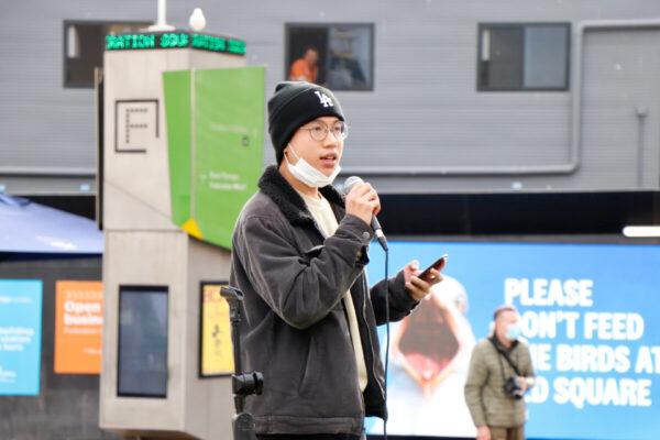 Hong Kong youth Max calls for boycotting Beijing's 2022 Winter Olympics in Melbourne, Australia, on June 23, 2021. (The Epoch Times)