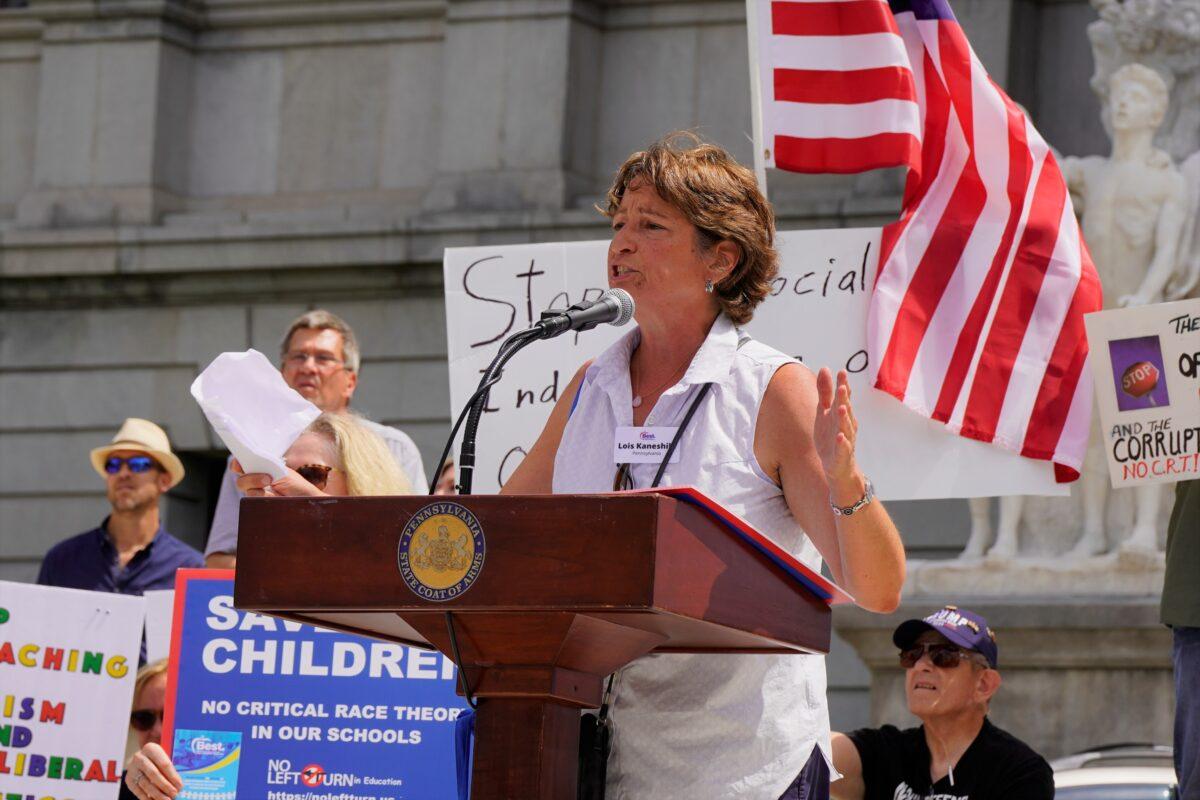 Lois Kaneshiki and the group Stop Common Core, CRT, & Action Civics in Pennsylvania organized the Rally to End Critical Race Theory on the Capitol building steps in Harrisburg, Pa., on July 14, 2021. (Steve Wen/Epoch Times)