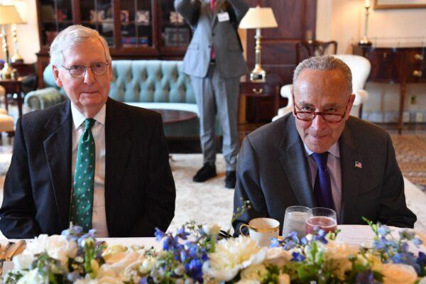 Senate Majority Leader Chuck Schumer (D-N.Y.) (R) and Senate Minority Leader Mitch McConnell (R-Ky.) meet Iraqi Prime Minister Mustafa al-Kadhemi (not shown) during a lunch at the U.S. Capitol in Washington on July 28, 2021. (Nicholas Kamm/AFP via Getty Images)