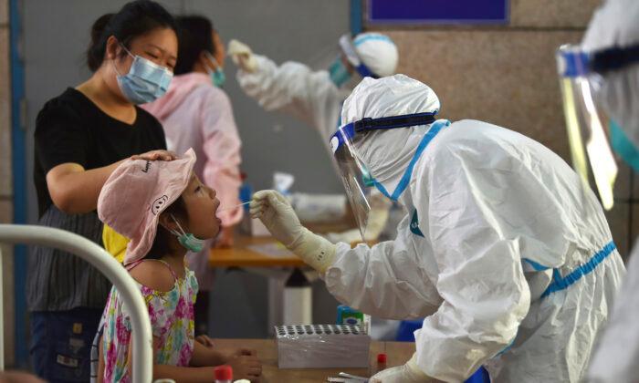 China Seals City as Its Worst Virus Outbreak in a Year Grows
