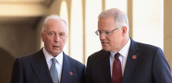 Former Prime Minister Paul Keating and Prime Minister Scott Morrison (R) walk along the Roll of Honour during the Remembrance Day Service at the Australian War Memorial in Canberra, Australia, on Nov. 11, 2018. (Tracey Nearmy/Getty Images)