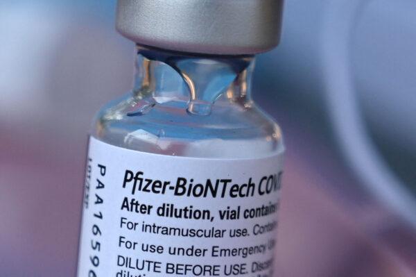 A vial of Pfizer-BioNTech COVID-19 vaccine is seen in Los Angeles, Calif., on Aug. 23, 2021. (Robyn Beck/AFP via Getty Images)