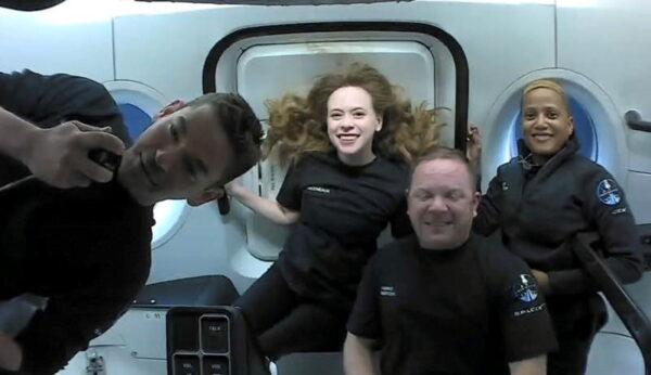 Inspiration4 crew Jared Isaacman, Sian Proctor, Hayley Arceneaux, and Chris Sembroski, seen on their first day in space in this handout photo released on Sept. 17, 2021. (SpaceX/Handout via Reuters)