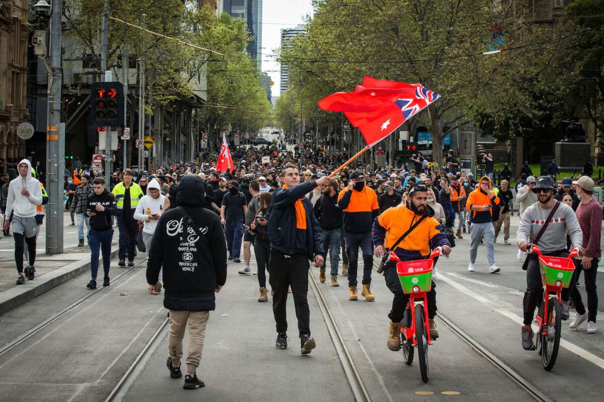 Protesters march through the streets in Melbourne, Australia, on Sept. 22, 2021. (Darrian Traynor/Getty Images)