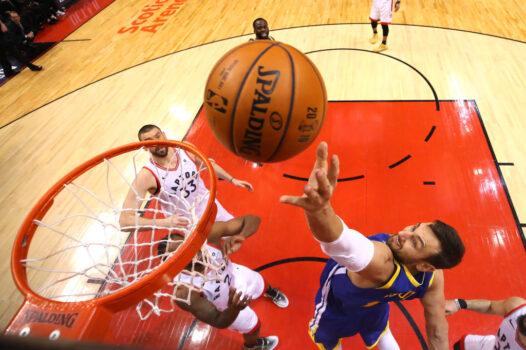 Andrew Bogut former #12 of the Golden State Warriors attempts a shot against the Toronto Raptors during Game Two of the 2019 NBA Finals at Scotiabank Arena in Toronto, Canada, on June 2, 2019. (Kyle Terada - Pool/Getty Images)
