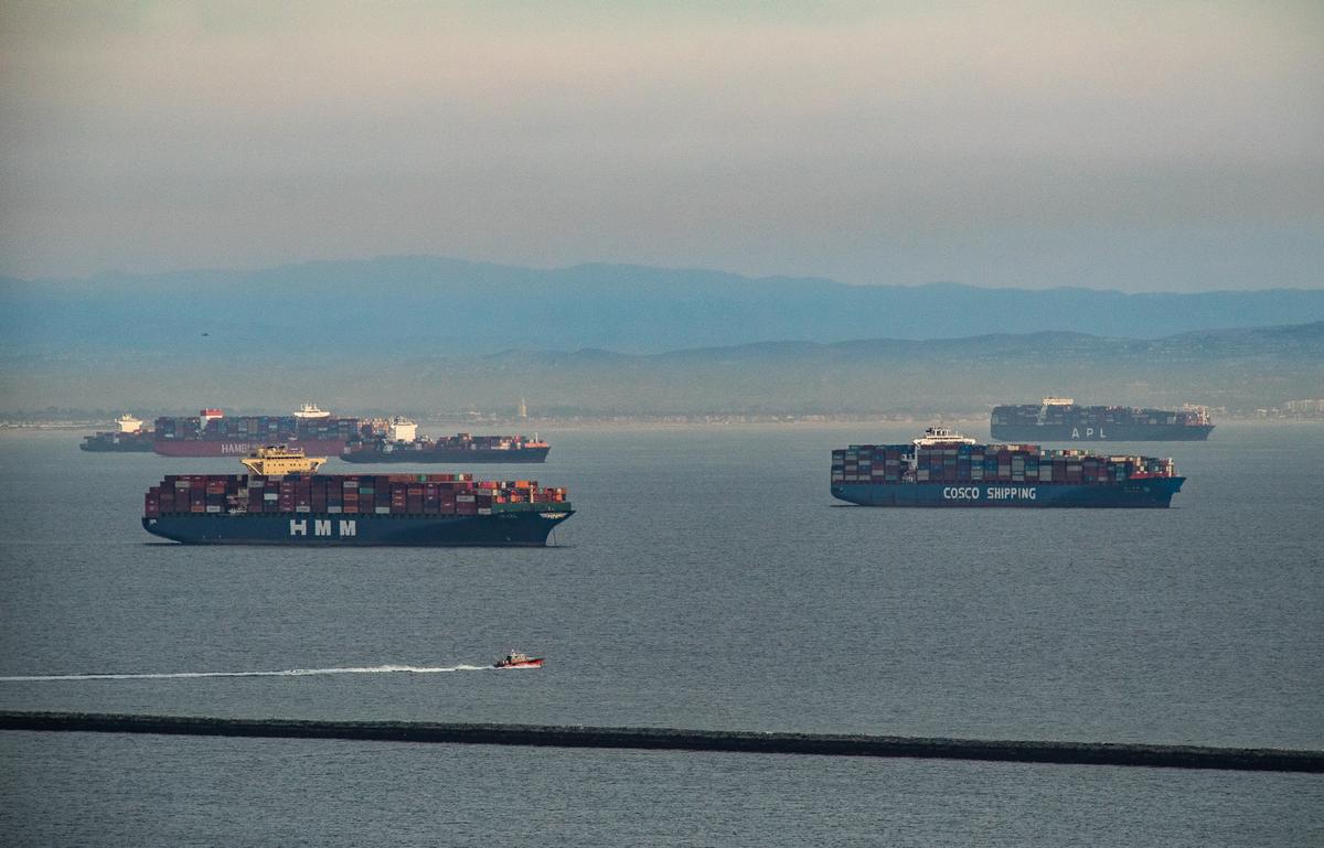 Cargo ships sit backlogged outside the ports of Los Angeles and Long Beach, Calif., on Jan. 12, 2021. (John Fredricks/The Epoch Times)