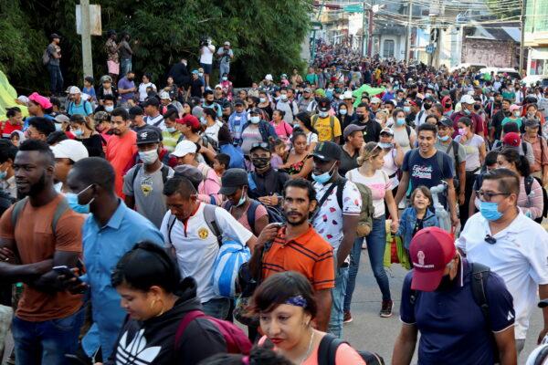 Illegal immigrants from Central America and Haiti in a caravan headed to the Mexican capital to apply for asylum status, in Tapachula, in Chiapas state, Mexico, on Oct. 23, 2021. (Jose Torres/Reuters)