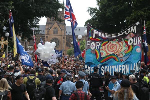 Protesters gather at Hyde Park during the 'World Wide Rally For Freedom' Against Mandatory COVID-19 Vaccines in Sydney, Australia, on Nov. 20, 2021. (Lisa Maree Williams/Getty Images)