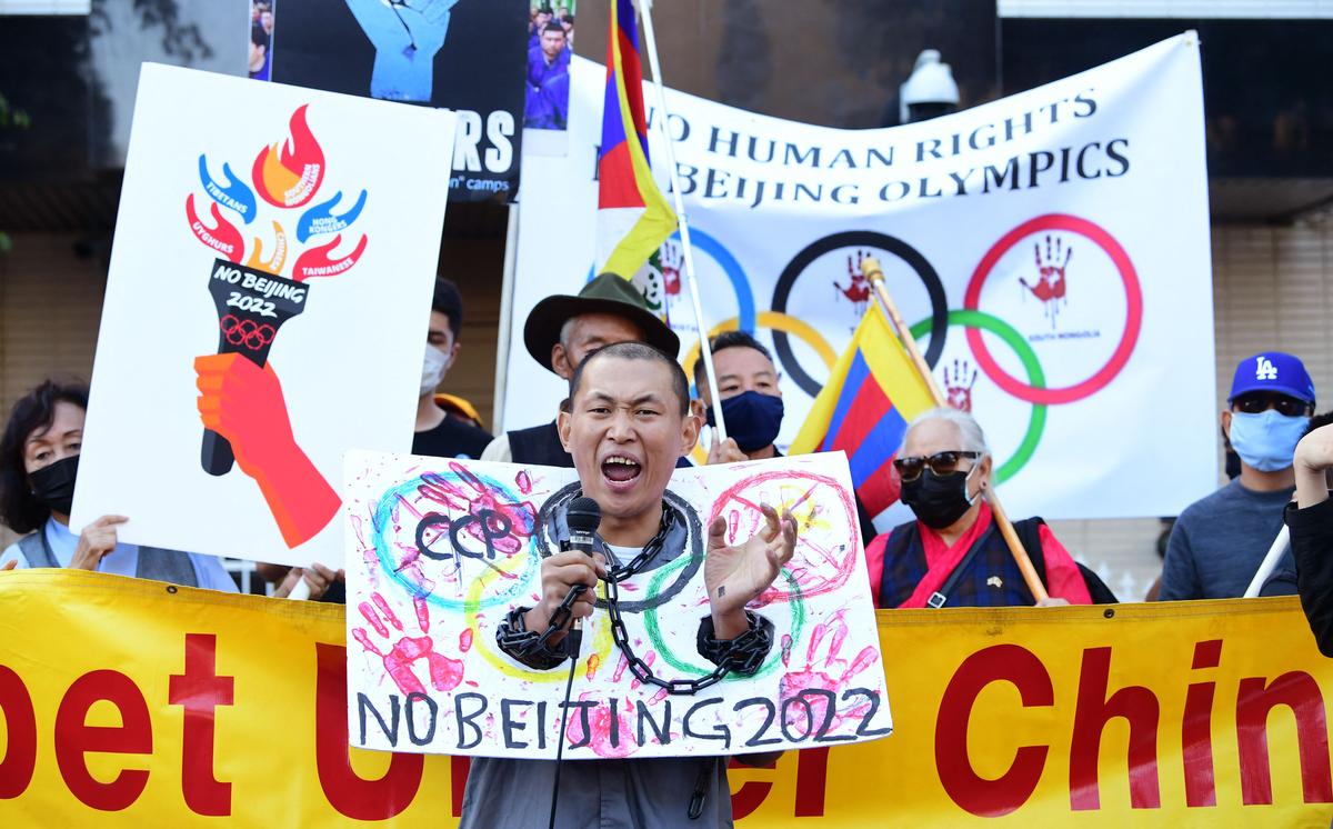 Activists rally in front of the Chinese Consulate in Los Angeles, California, calling for a boycott of the 2022 Beijing Winter Olympics due to concerns over China's human rights record on Nov. 3, 2021. (Frederic J. Brown/AFP via Getty Images)