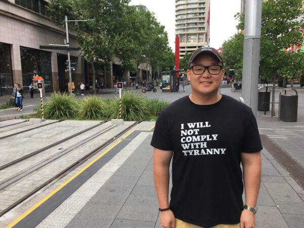 Daniel Kim, 28, attended an anti-vaccine mandate protest in Sydney, Australia, on Nov. 20, 2021. (The Epoch TImes)