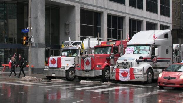 Trucks parking on the street of Ottawa protesting against COVID-19 mandates and restrictions on Feb. 10, 2022. (Annie Wu/NTD Television)