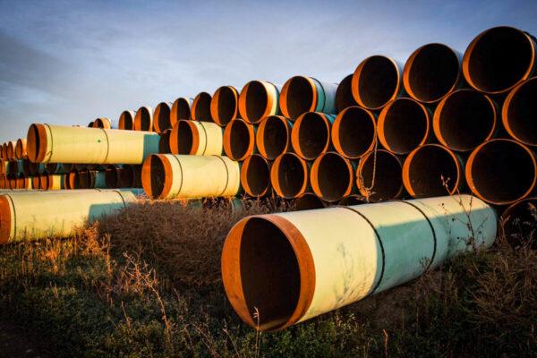 Miles of unused pipe, prepared for the proposed Keystone XL pipeline, sit in a lot outside Gascoyne, N.D., on Oct. 14, 2014. (Andrew Burton/Getty Images)