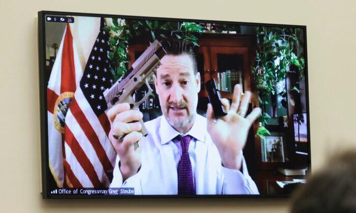 GOP Rep. Displays Guns During Hearing He Says Will Be Banned by Legislation