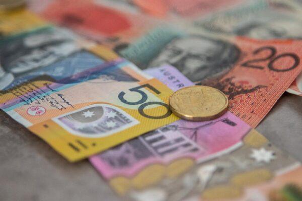 Australian banknotes and a one-dollar coin. (Squirrel_photos/pixabay)