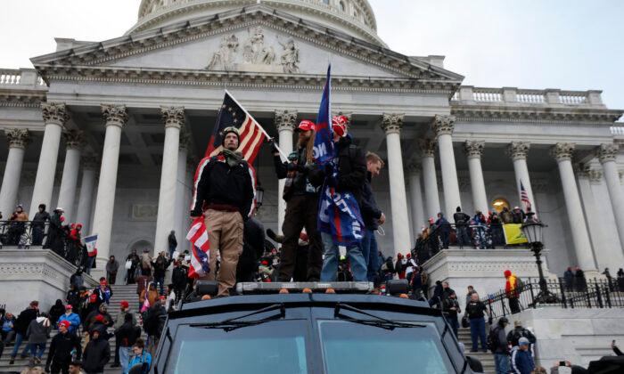 Capitol Rioter Gets 33 Months in Jail for Hitting Police With Wooden Plank