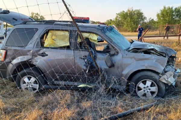 Law enforcement and emergency medical personnel respond to a crashed smuggling vehicle in Kinney County, Texas, on June 29, 2022. (Kinney County Sheriff's Office)