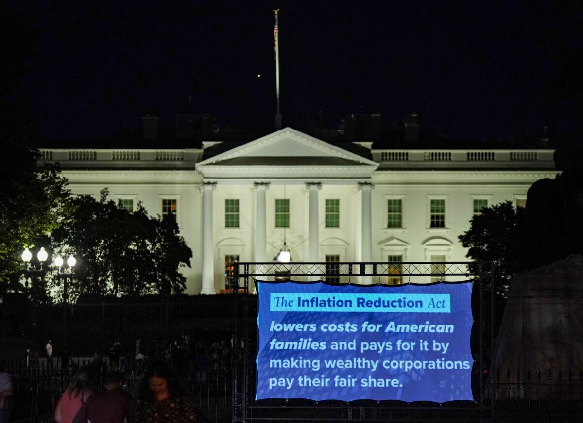 A projection display thanking Democrats for the passage of the Inflation Reduction Act is displayed in front of the White House on Aug. 12, 2022. (Jemal Countess/Getty Images)