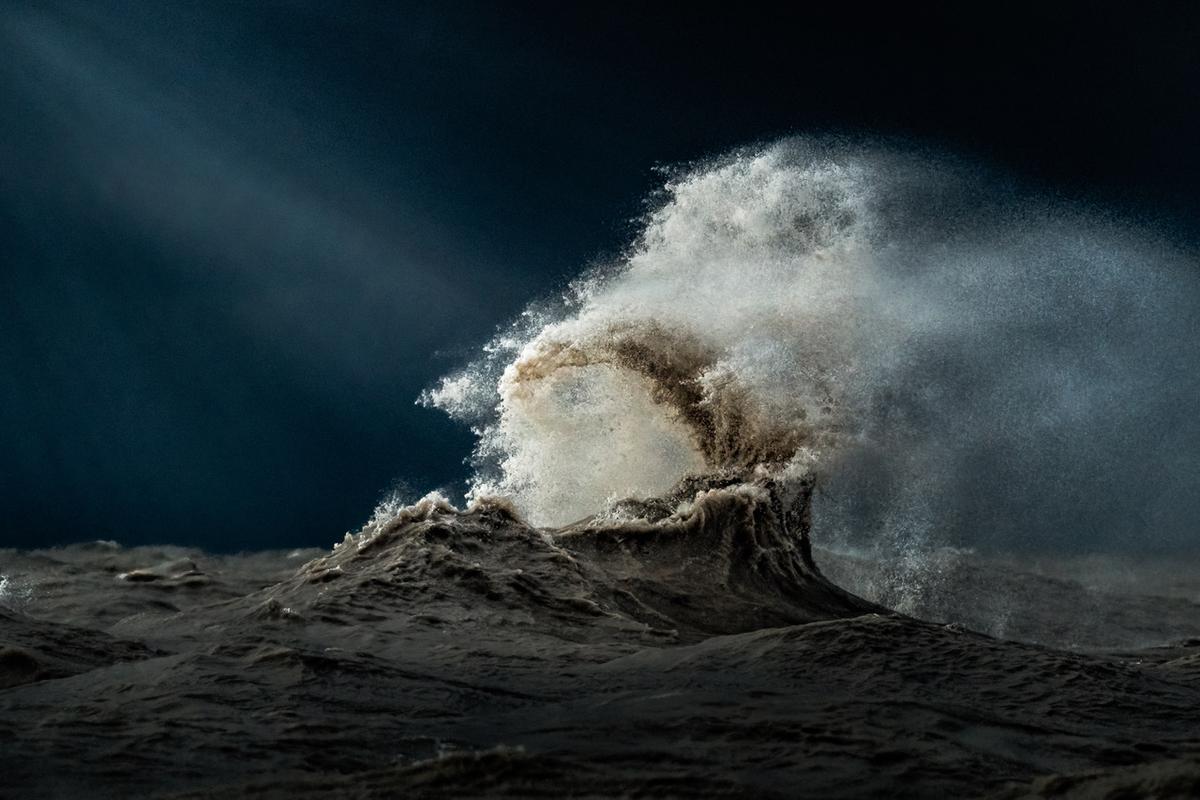 Waves lit by sublime light at Lake Erie in 2022. (Courtesy of <a href="https://www.instagram.com/trevorpottelbergphotography/">Trevor Pottelberg Photography</a>)