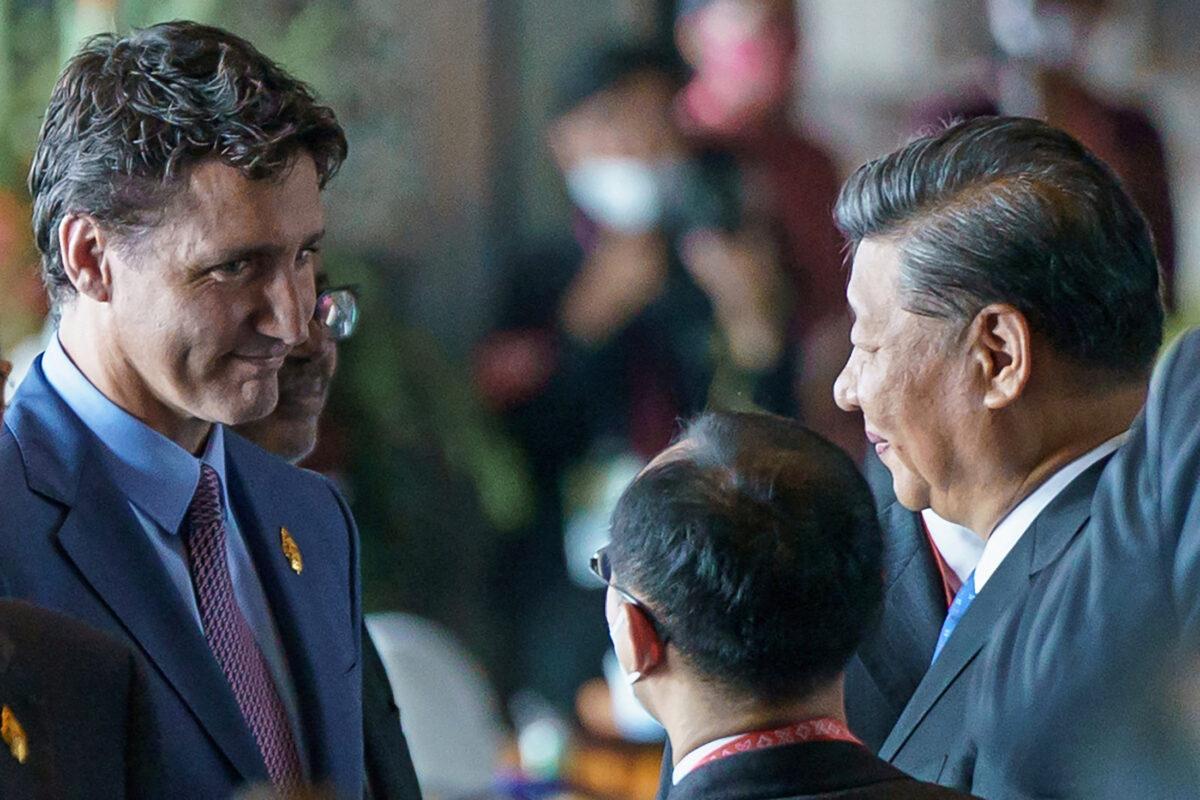 Prime Minister Justin Trudeau speaks with Chinese Leader Xi Jinping at the G-20 Leaders' Summit in Bali, Indonesia, on Nov. 15, 2022. (Adam Scotti/Prime Minister's Office/Handout via Reuters)