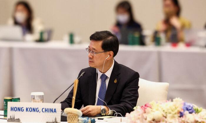 Hong Kong Leader Tests Positive for COVID-19 After APEC Summit