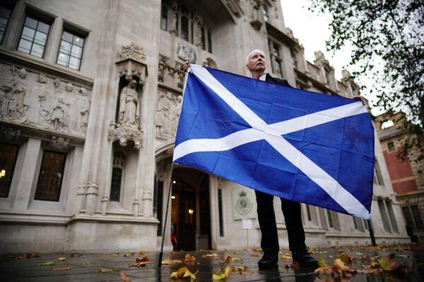A Scottish independence supporter outside the UK Supreme Court in London, following the decision by Supreme Court judges that the Scottish Parliament does not have the power to hold a second independence referendum, on Nov. 23, 2022. (Aaron Chown/PA Media)