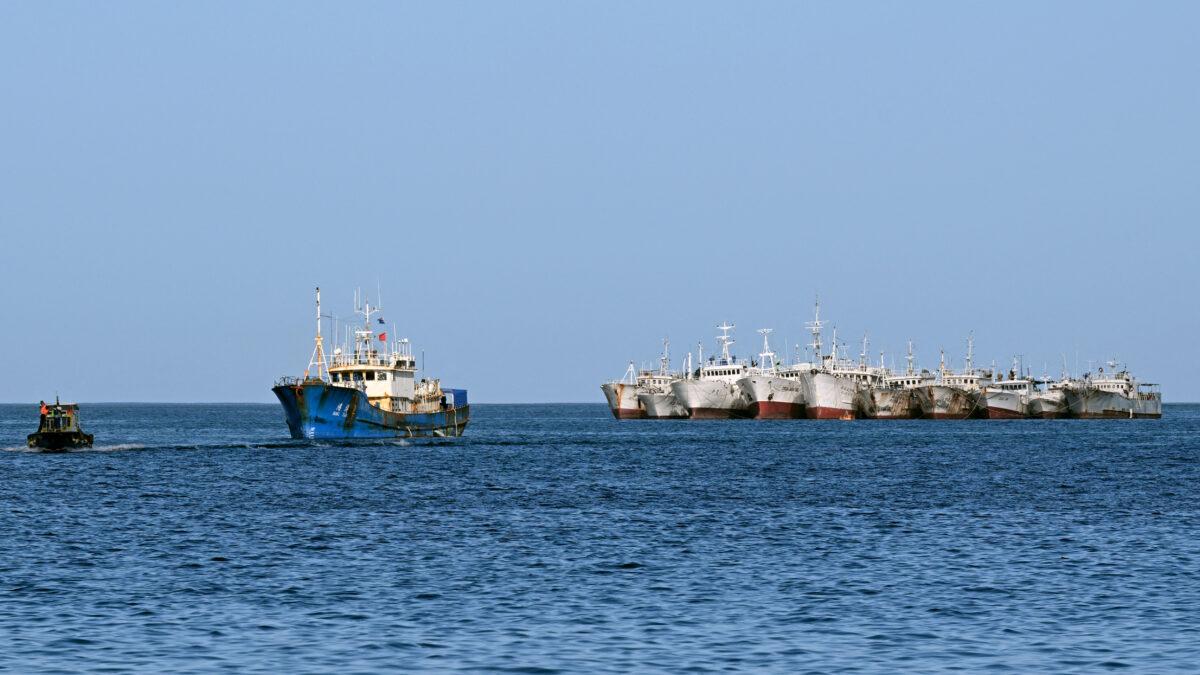 A Chinese-flagged fishing vessel (2nd L) enters Suva Harbor on July 15, 2022. (William West/AFP via Getty Images)
