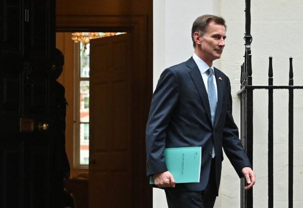 Britain's Chancellor of the Exchequer Jeremy Hunt walks out of Number 11 Downing Street on his way to make a full budget statement in the House of Commons, in London, on Nov. 17, 2022. (Justin Tallis/AFP via Getty Images)